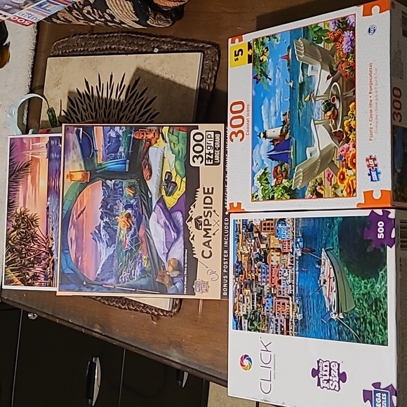 4 puzzles - Picture 1 of 5